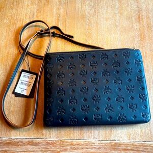 MCM black with brown leather trim crossbody bag